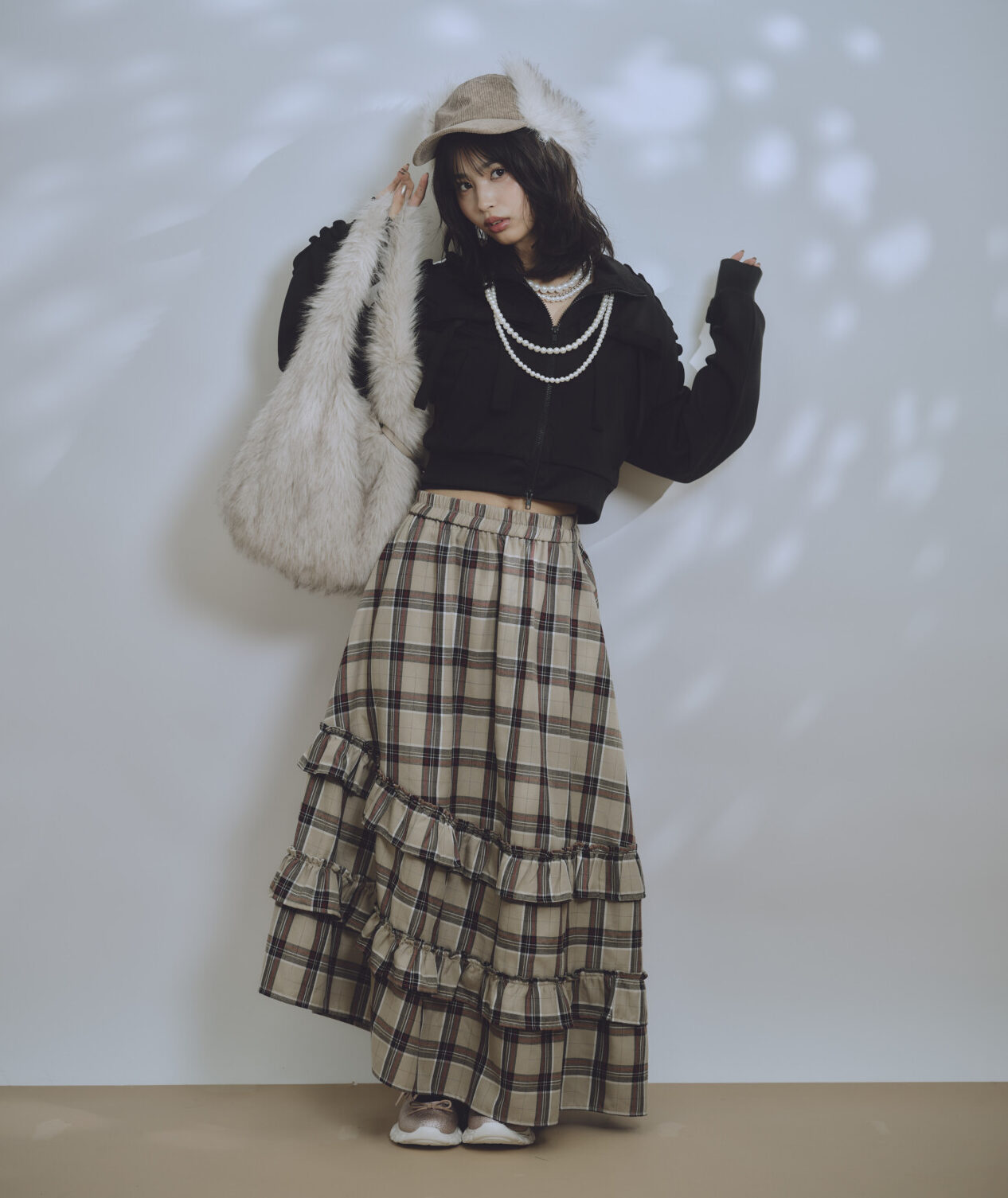 海外ガールのふわもこは「フライトファーキャップ」！